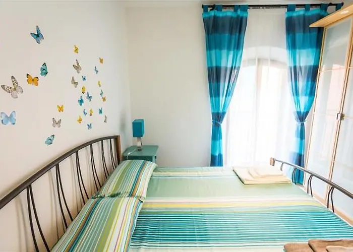 Guesthost - Butterfly Apartment